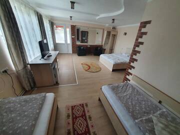 Фото номера Семейный номер Делюкс Фермерские дома Pensiunea Dandu г. Корбени 5