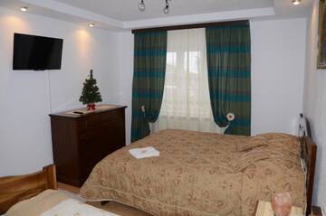 Фото номера Семейный номер с ванной комнатой Гостевой дом Rustic Argesean г. Корбени 7