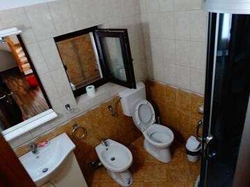 Фото номера Номер с кроватью размера «king-size» и балконом Гостевой дом Pensiunea Casa Maria г. Корбени 4